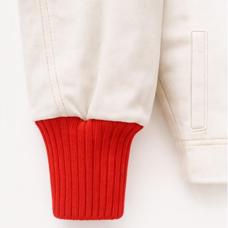 Blouson crème avec bord côte orange