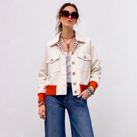 Blouson crème avec bord côte orange