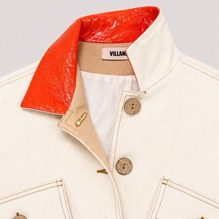 Blouson écru manches  courtes avec bord côte et col orange