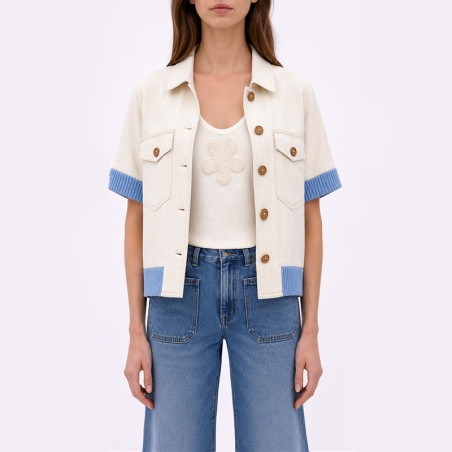 Blouson blanc cassé avec bord côte ciel sans manches