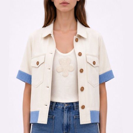 Blouson blanc cassé avec bord côte ciel sans manches