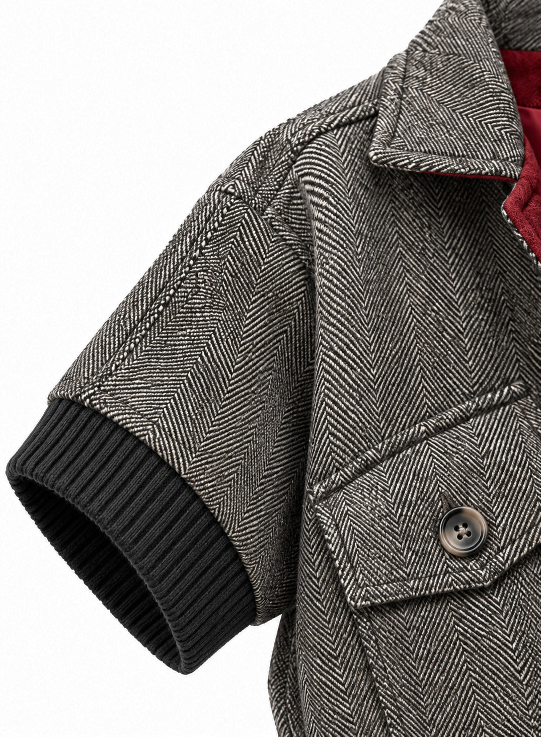 Blouson manches courtes en laine chevron gris avec bord côte noir