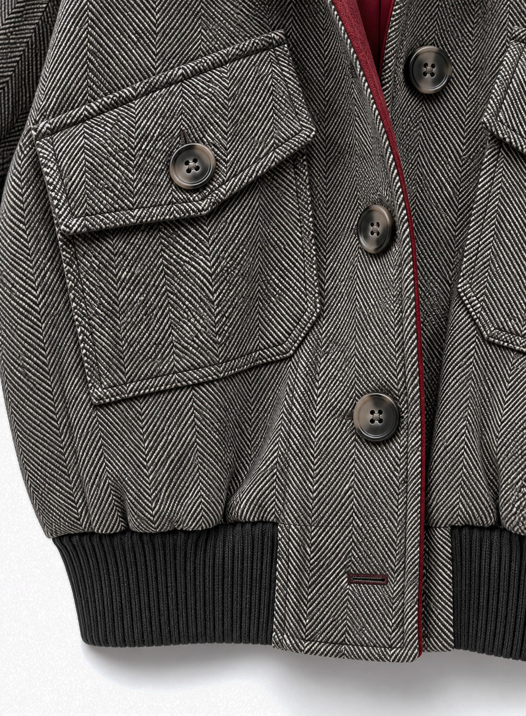 Blouson manches courtes en laine chevron gris avec bord côte noir